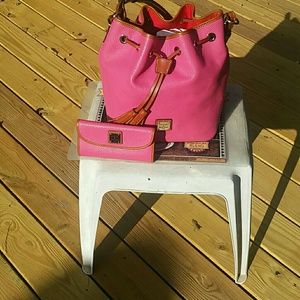 Dooney & Bourke Pink w/ brown trimming EUC